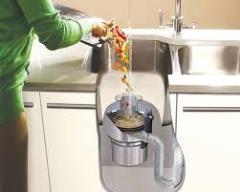 دستگاه خردکن پسماند غذا در سینک ظرفشویی